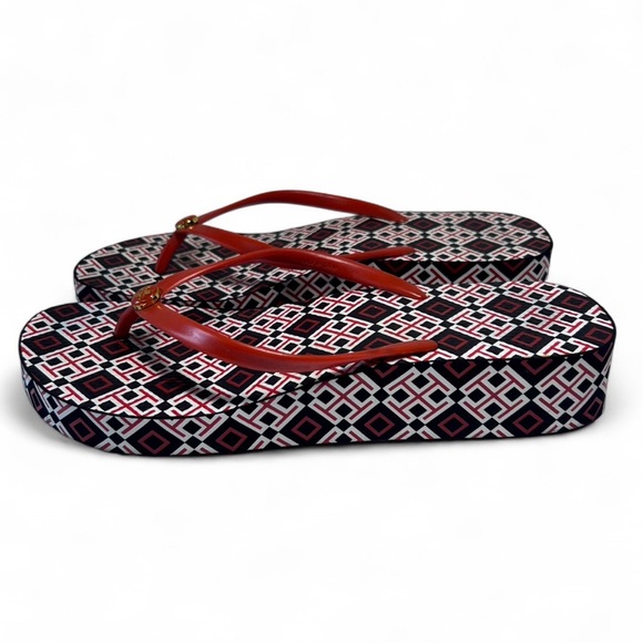 Tory Burch Shoes - Tory Burch Thandie Wedge Flip-Flops, brand's geometric logo print. Size 9.5
